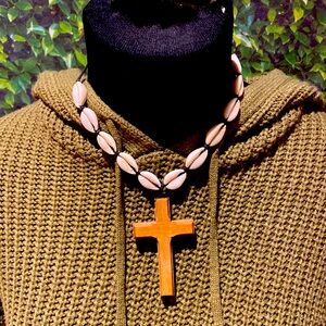 A seashell cross necklace